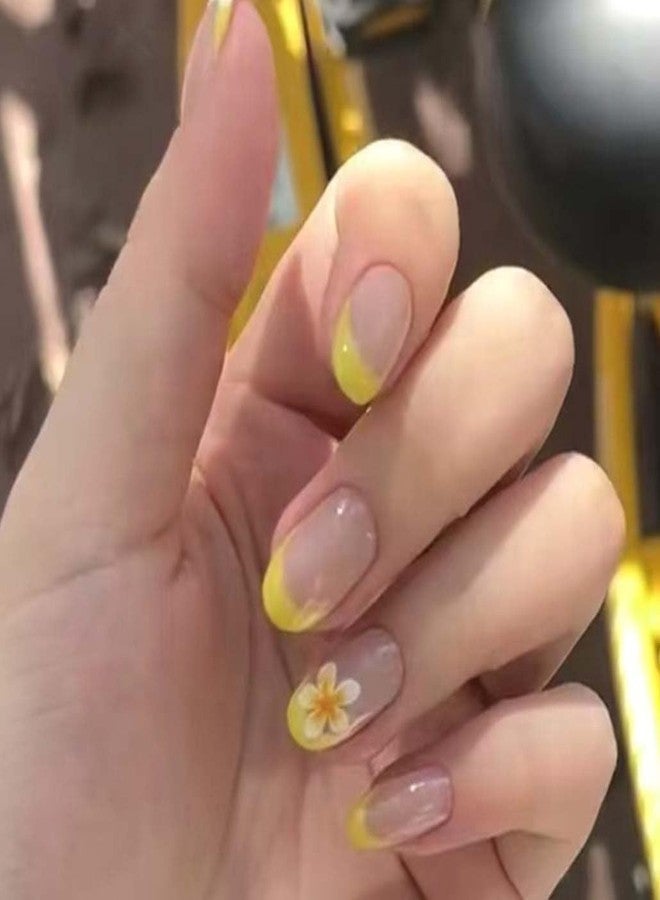 Foccna 24Pcs Press on Nails Short Almond Fake Nails with Flower Designs Nude Yellow Glossy Full Cover Stick on Nails Acylic Nails for Women and Girls - Image 1